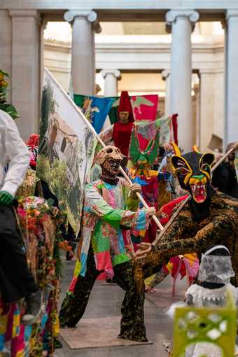 Photograph of The Procession in the Duveen Galleries at Tate Britain