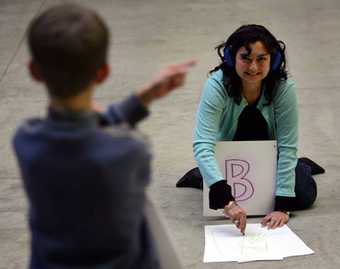 Kids doing the Make your mark activity at Tate Modern